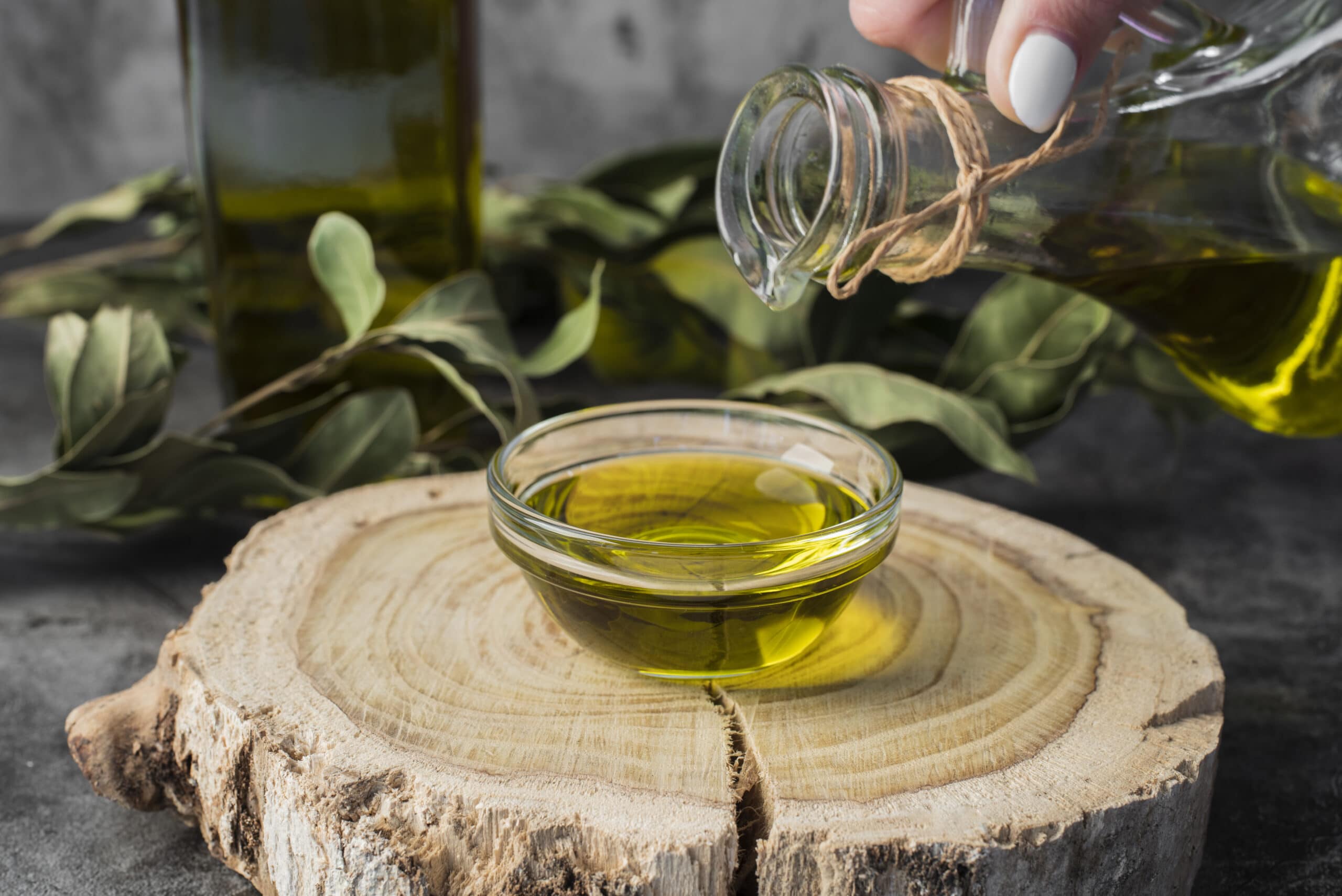close-up-olive-oil-pouring-into-bowl(1)
